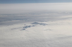 Peaks of the Alps rising out of the clouds