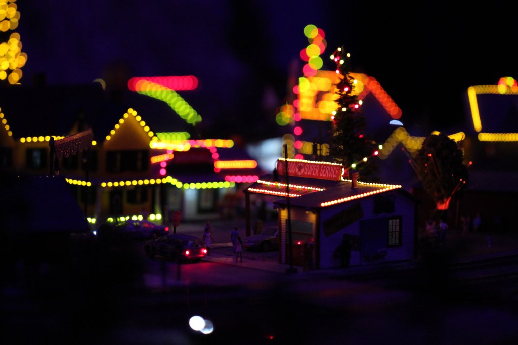 IMG_5700.JPG - Lights in the  Miniatur Wunderland  ( miniature wonderland ). The world largest miniature railway not only host trains but also running cars, trucks, ship and even "flying" airplanes.