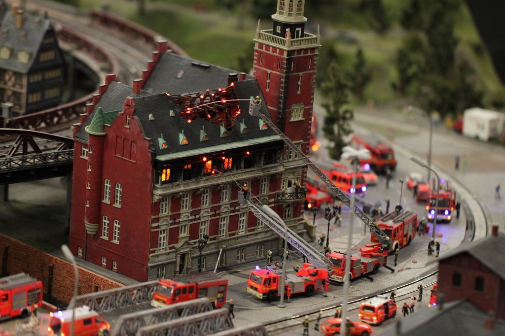 IMG_5726.JPG - Fire department in action in the  Miniatur Wunderland  ( miniature wonderland ). The world largest miniature railway not only host trains but also running cars, trucks, ship and even "flying" airplanes.