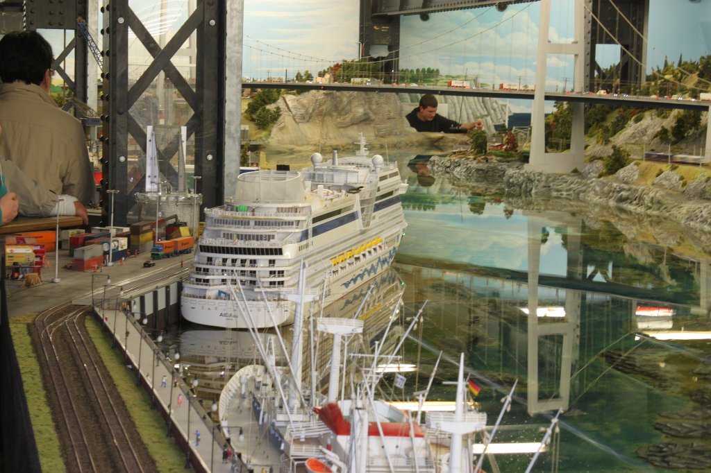 IMG_5757.JPG - AIDA cruise ship in the  Miniatur Wunderland  ( miniature wonderland ). The world largest miniature railway not only host trains but also running cars, trucks, ship and even "flying" airplanes.