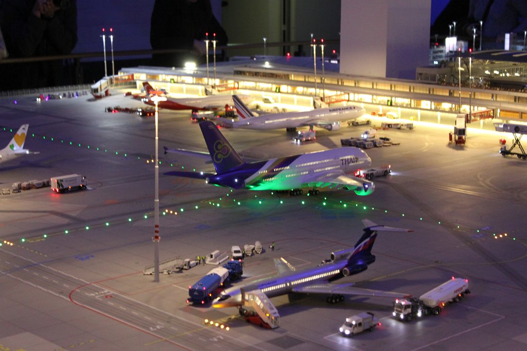 IMG_5842.JPG - Thai Airways A380  Miniatur Wunderland  ( miniature wonderland ). The world largest miniature railway not only host trains but also running cars, trucks, ship and even "flying" airplanes.