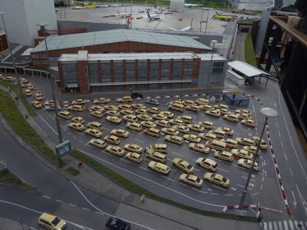 P1050486.JPG - Taxis at the airport in the  Miniatur Wunderland  ( miniature wonderland ). The world largest miniature railway not only host trains but also running cars, trucks, ship and even "flying" airplanes.