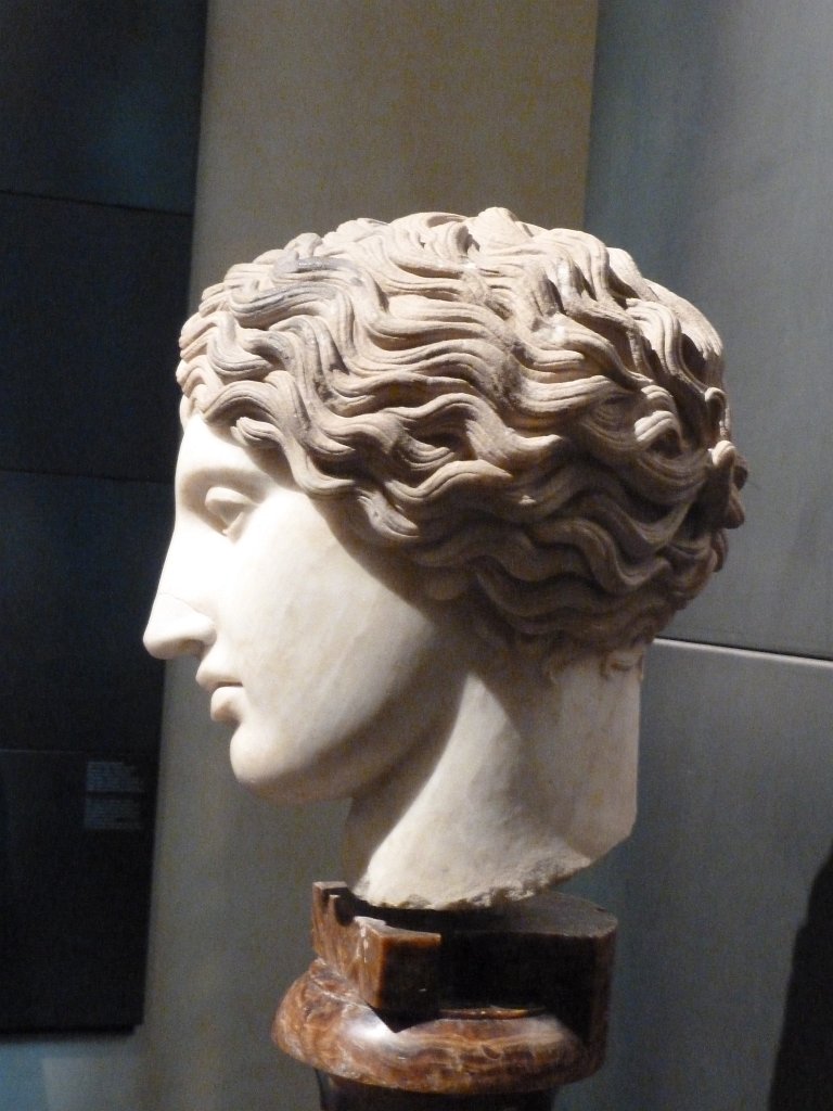 P1100541.JPG - Head of an Amazon, Greek marble, Copy after the bronze original created for the artistic contest for the town of Ephesus that took place in 440 - 430 B.C., summoning all major Greek artists. From the Horti Maecenatiani, found in the area near the Auditorium (1874).  Capitoline Museums .