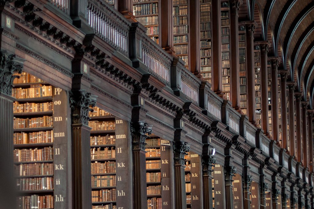 IMG_6539_c1.jpg - The Long Room of the Old  Library  of  Trinity College  in Dublin. The library was founded together with the college in 1592. The library has legal deposit rights for Ireland and Great Britain. As such even the long room, even though extended in height, is far too small for all the books. The long room is the main chamber of the old library and was build between 1712 and 1732. It houses 200000 of the oldest books of the library.