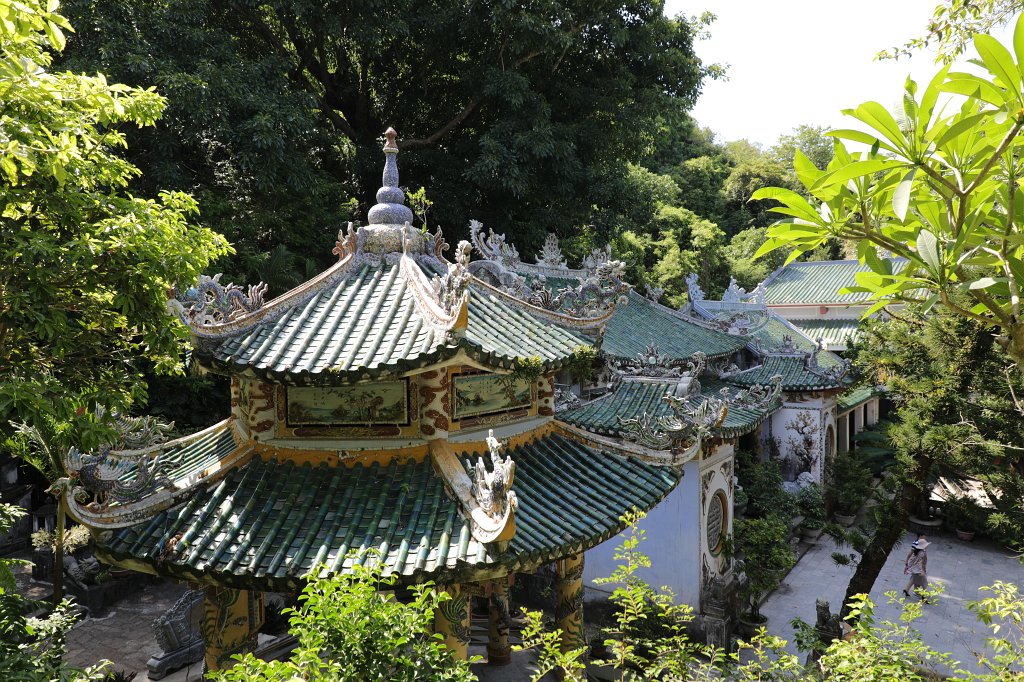 574A7890.JPG -  Marble Mountains . The marble mountain are a cluster of 5 hills named after the five elements Kim (metal), Thuy (water), Moc (wood), Hoa (fire) and Tho (earth). Thuy Son is the one which is easily accessible, through an elevator, has Buddhist and Hindu grottoes, sanctuaries, pagodas, the tower of Pho Dong and a panoramic view on the other marble mountains.