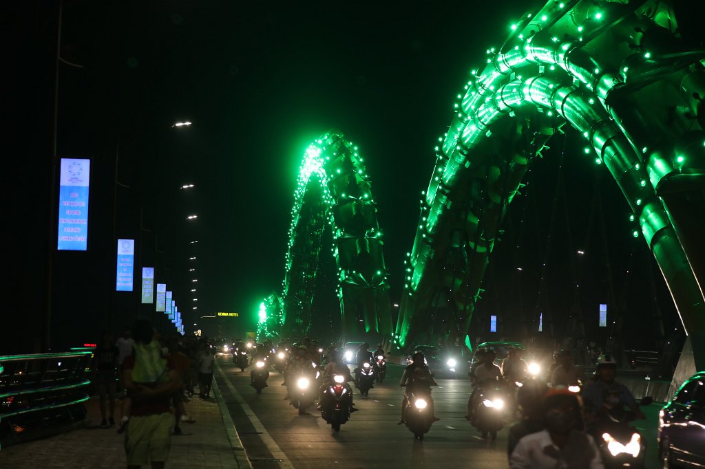 574A8012.JPG -  Dragon Bridge   Danang . Each Saturday and Sunday evening at 9PM the dragon "breathes" fire or water. In our case it was water but still a show.