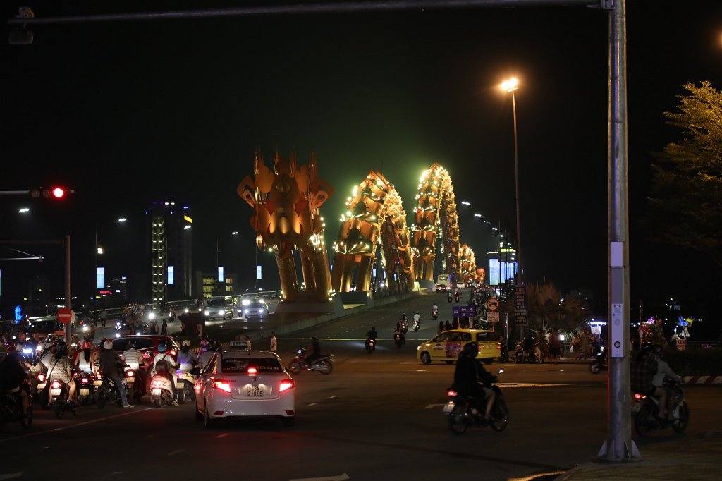 574A8021.JPG -  Dragon Bridge   Danang . Each Saturday and Sunday evening at 9PM the dragon "breathes" fire or water. In our case it was water but still a show.